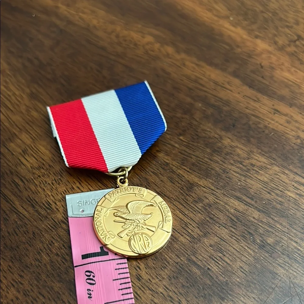 Gold Medal with Red, White, and Blue Ribbon Natinal Patriots Medal